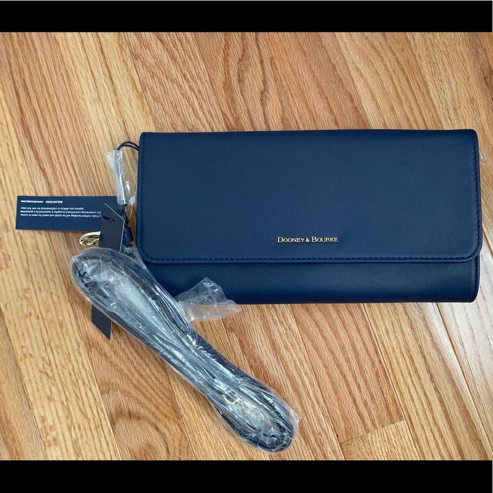 Brand new Dooney and Bourke clutch/cross body